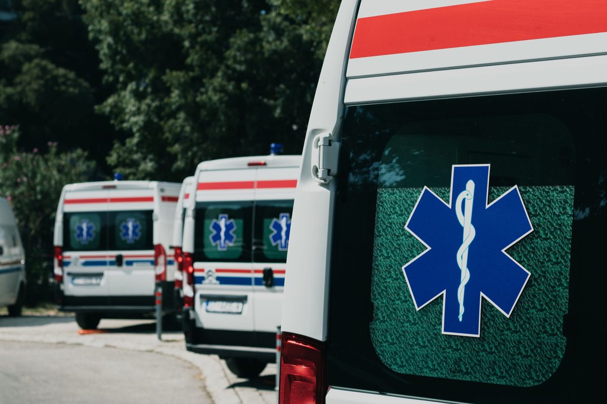 A fleet of ambulances parked in sequence